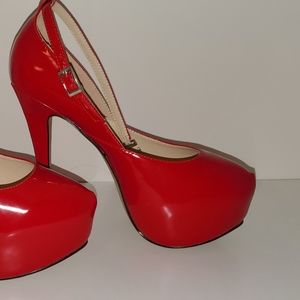 Pretty and sexy red patent stilettos with strap